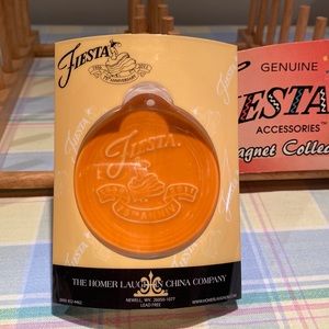 Fiestaware tangerine ornament. New in package. Never used